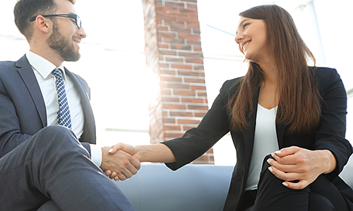 Handshake,Business man holding hands together closeup