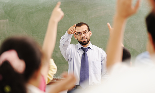 arabic kids in the school, classroom wit a teacher